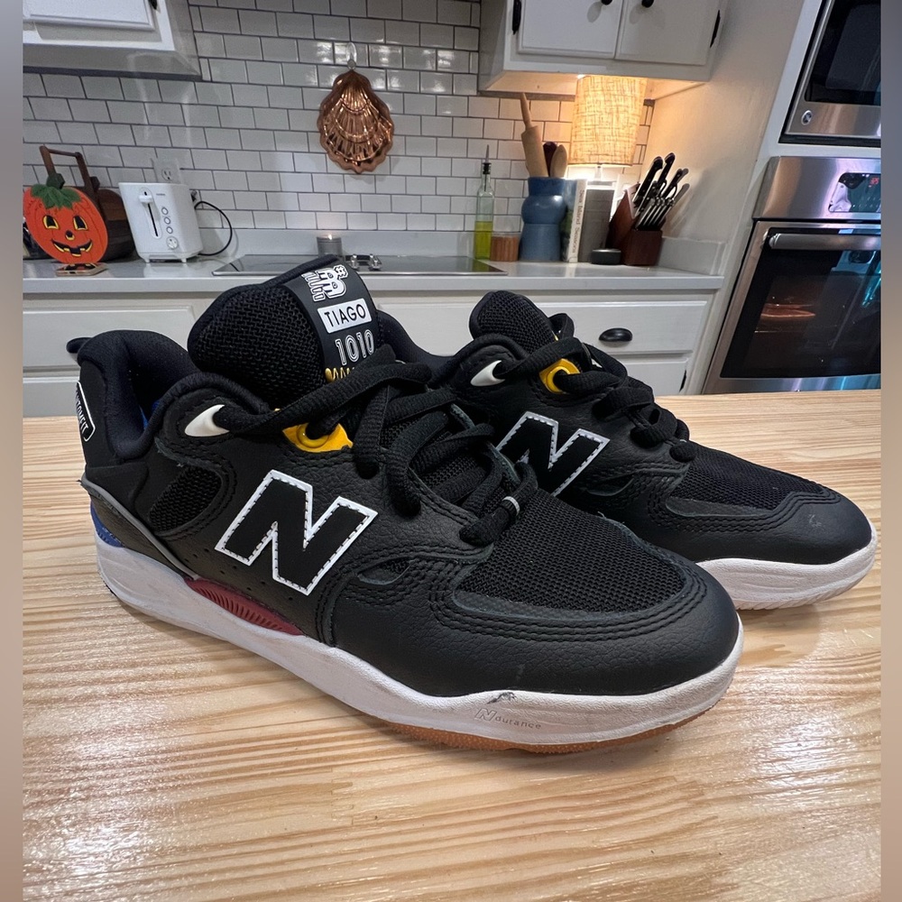 New Balance numeric Tiago 1010 Black and Blue Athletic Shoes